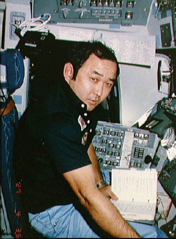 Ellison Onizuka Sitting at the Space Shuttle Commander's Station